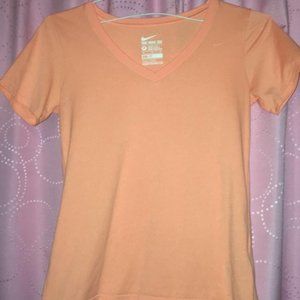 The Nike Tee, v-neck athletic peach colored tee